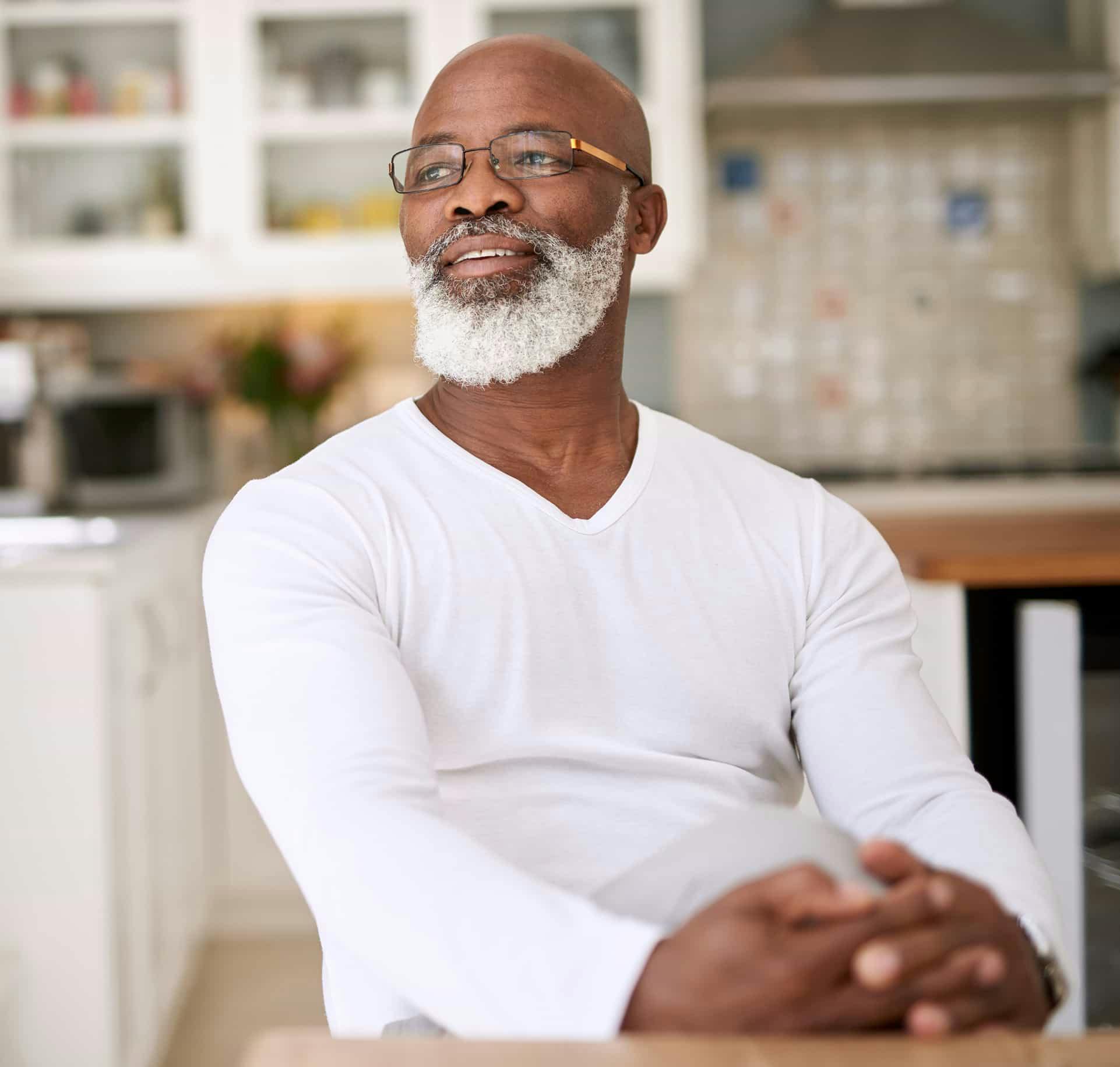 Older man sitting at the dining table