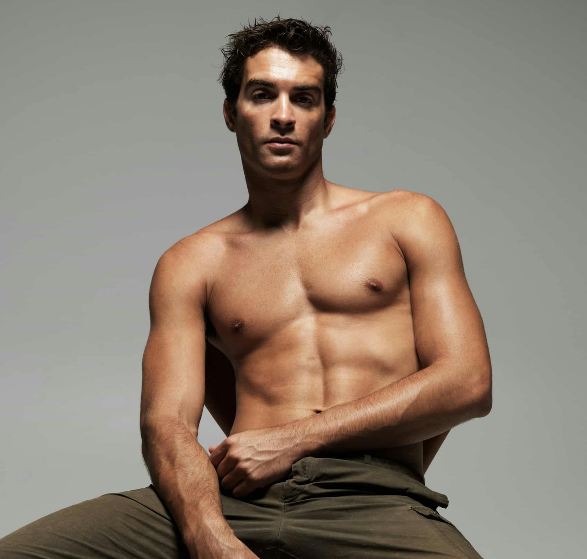 shirtless man posing