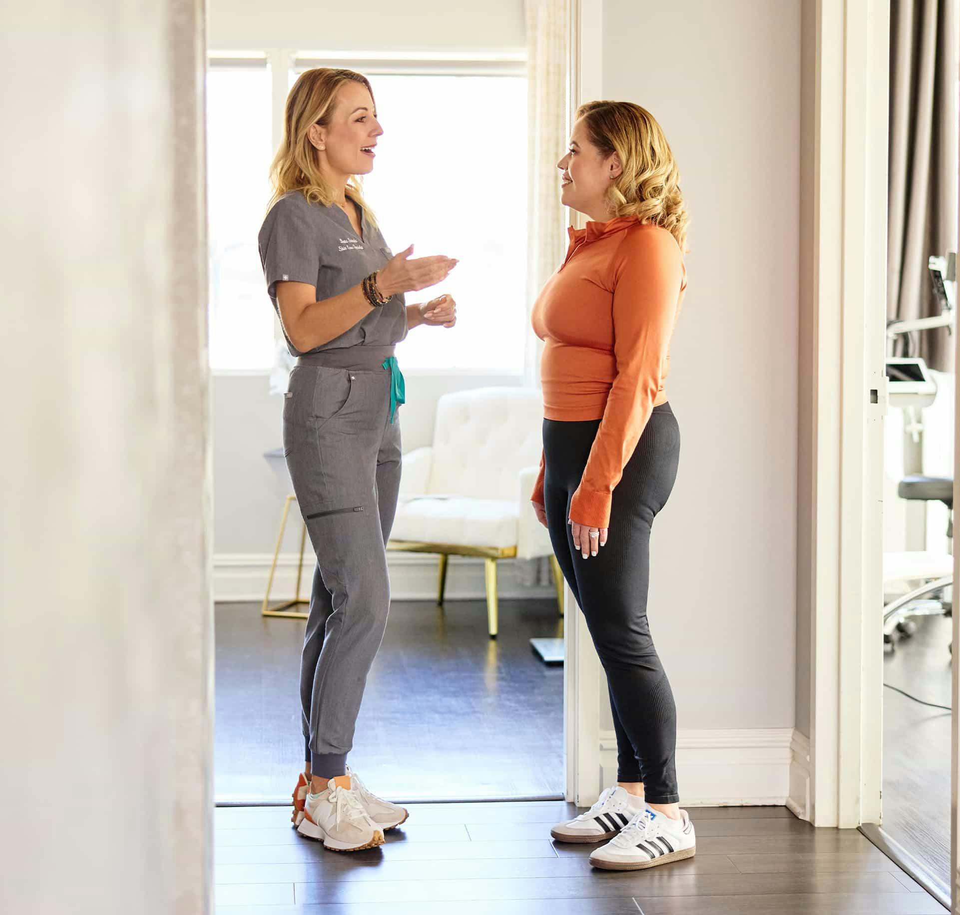 Nurse speaking with patient