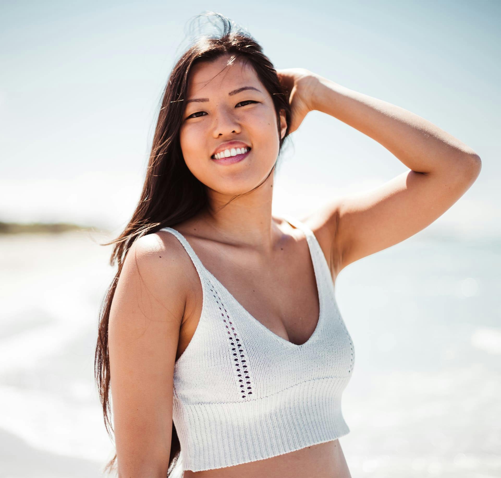 Woman in bra laughing