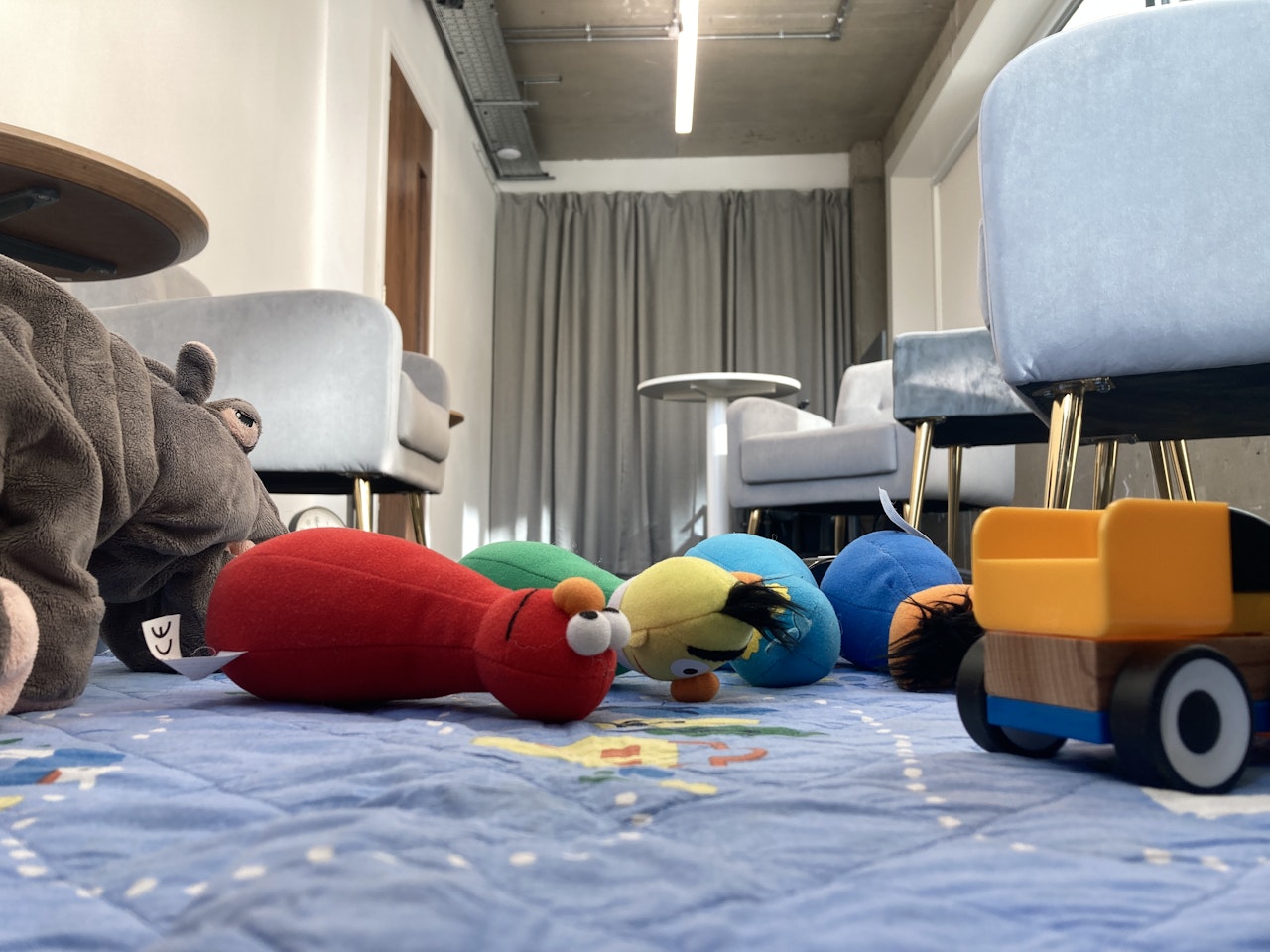 Interview room with toys on the ground