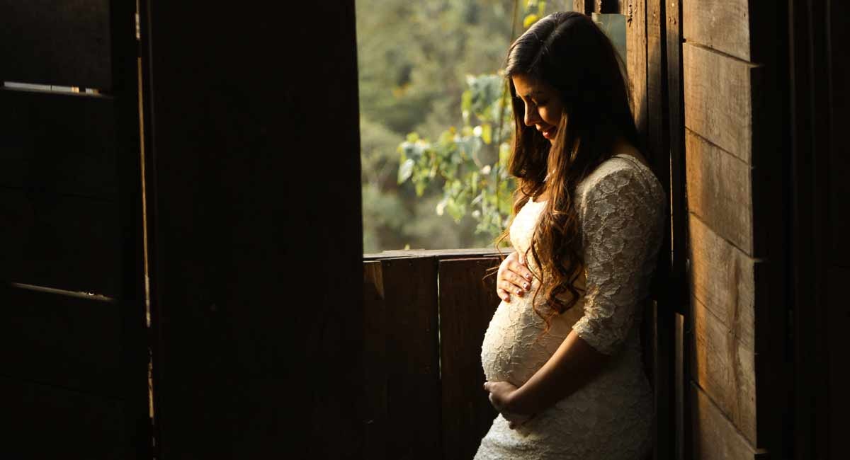 pregnancy-baby-bump-woman-unsplash