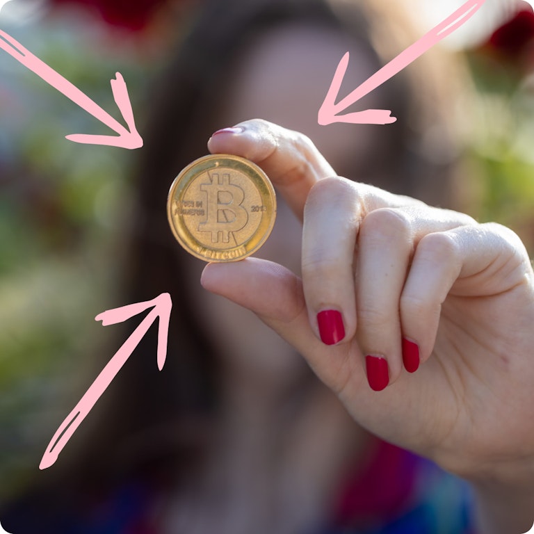 Woman holding a gold coin