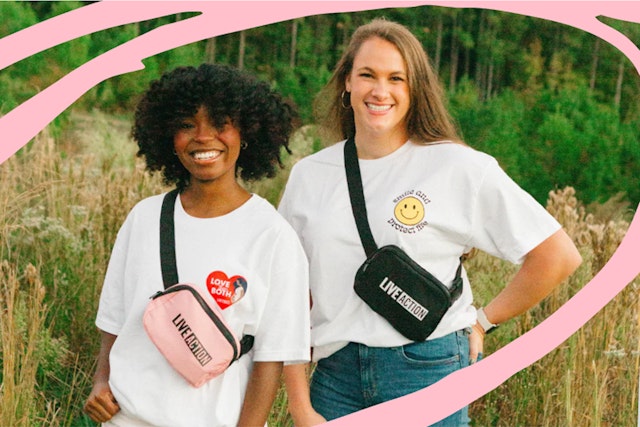 Two teenage girls smiling in a field