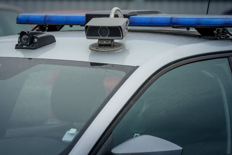 Police car roof camera for video recording and proof of traffic violations, speeding, passing traffic light at red , driving in wrong lane, etc. Big brother is watching..