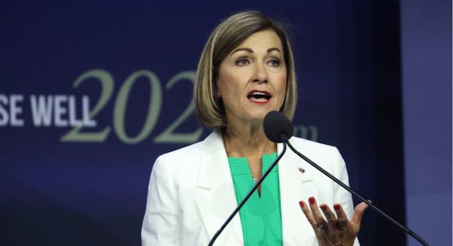 DES MOINES, IOWA – JULY 14: Iowa Governor Kim Reynolds speaks to guests before signing into law a bill that will ban most abortions after around six weeks of pregnancy during a visit to the Family Leadership Summit on July 14, 2023 in Des Moines, Iowa. Several Republican presidential candidates were scheduled to speak at the event, billed as “The Midwest’s largest gathering of Christians seeking cultural transformation in the family, Church, government, and more.” (Photo by Scott Olson/Getty Images) Iowa prenatal education bill heads to governor’s desk image