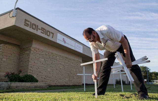 WICHITA, KS – AUGUST 12: Mark Gietzen is the chairman for Kansas Coalition for Life. He arrives nearly every morning at the South Wind Women’s Center in Wichita to places crosses in the lawn around the building and to offer “sidewalk counseling” to patients entering the facility. His group also keeps a log book to record the license plate information of every car that enters the facility. (Photo by Travis Heying for the Washington Post) Julie Burkhart, mentored by late-term abortionist, makes Time’s ‘100 Most Influential People’ image
