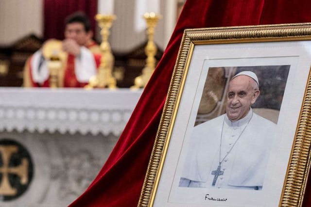 A portrait of the late Pope Francis is seen during a mass at the Metropolitan Cathedral in San Jose on April 21, 2025. Pope Francis died on April 21, 2025 aged 88, a day after making a much hoped-for appearance at Saint Peter’s Square on Easter Sunday, the Vatican said in a statement. (Photo by Ezequiel BECERRA / AFP) (Photo by EZEQUIEL BECERRA/AFP via Getty Images) Pope Francis, who advocated for the protection of all human beings, has died at 88 image