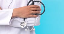 male doctor holding a stethoscope