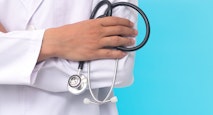 male doctor holding a stethoscope
