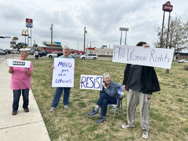 Counter-protesters from Baylor University amplify pro-life protests at CVS pharmacy image