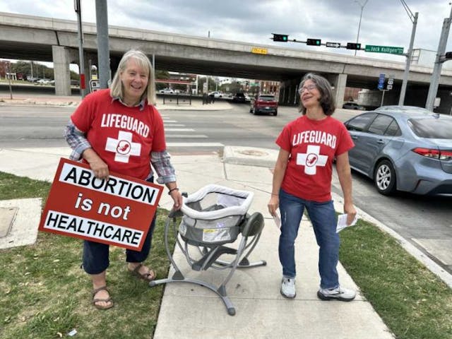 Counter-protesters from Baylor University amplify pro-life protests at CVS pharmacy image