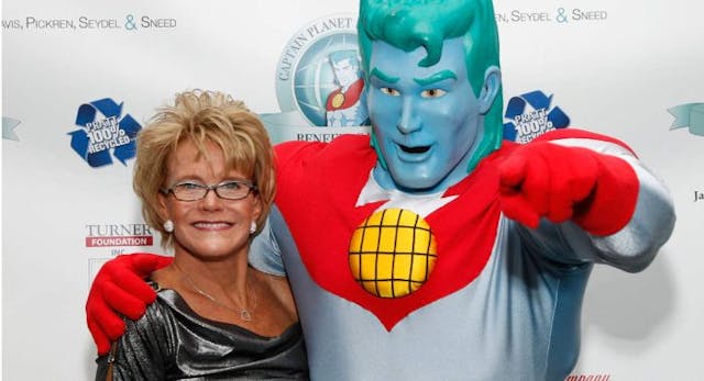 ATLANTA, GA – DECEMBER 09: Captain Planet Founder Barbara Pyle and Captain Planet attend the Captain Planet Foundation Annual benefit gala at the Georgia Aquarium on December 9, 2011 in Atlanta, Georgia. (Photo by Ben Rose/WireImage) ‘Captain Planet’: The childhood ‘hero’ that promoted population control and pro-abortion ideology image