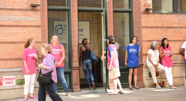 MANHATTAN, NEW YORK CITY, UNITED STATES – 2015/08/22: Planned Parenthood volunteers ensure access to clinic for patients with scheduled appointments during protest. A coalition of anti-abortion protesters protested on Mott Street in Manhattan in front of Planned Parenthood. (Photo by Andy Katz/Pacific Press/LightRocket via Getty Images) Planned Parenthood, buffer zone