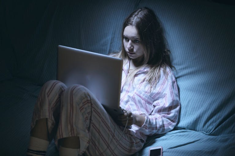 Young teenager chatting late at night. Is Planned Parenthood’s goal to educate teens, or to sexualize them? featured image