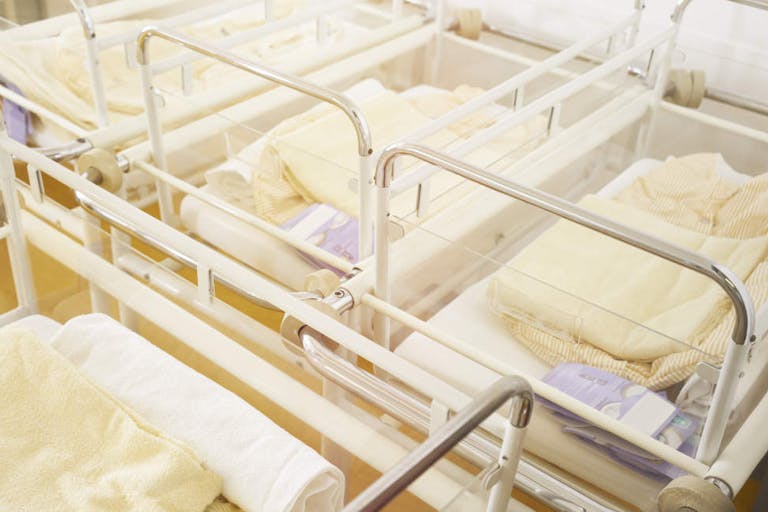 Hospital room wall white four beds