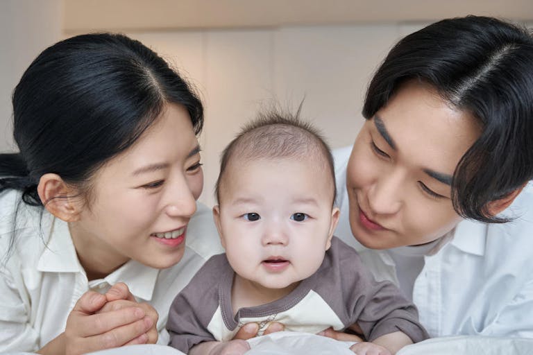 Dad, mom, baby, prone, smile, family