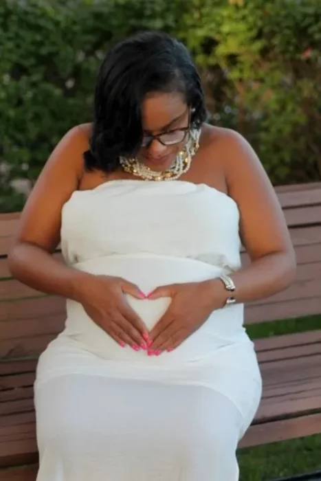 After resisting pressure to abort her twins, she now mentors single moms image