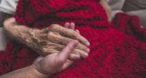 Hospice Nurse visiting an elderly male patient