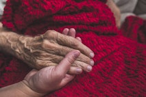 Hospice Nurse visiting an elderly male patient