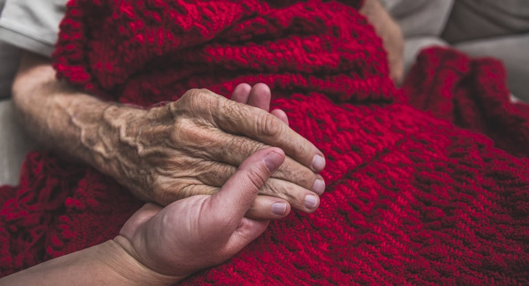 Hospice Nurse visiting an elderly male patient