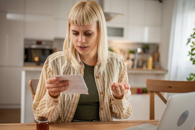 Young woman taking medication What the popular telehealth abortion ‘CHAT’ study claims to prove — and why it can’t be trusted featured image