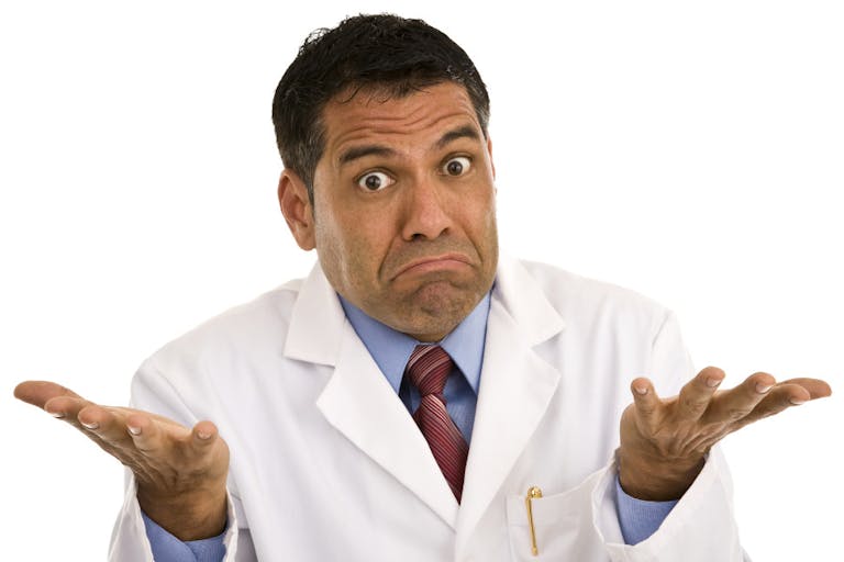 Mid adult male wearing lab coat gesturing making a face Australian advocates want to prevent suicides… by expanding government-sanctioned suicides featured image