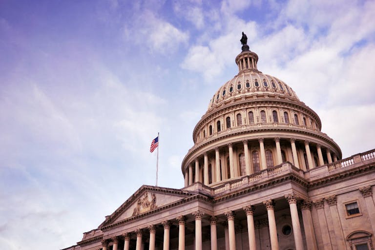 US Capitol building dome with American flag