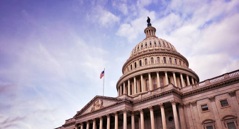 US Capitol building dome with American flag