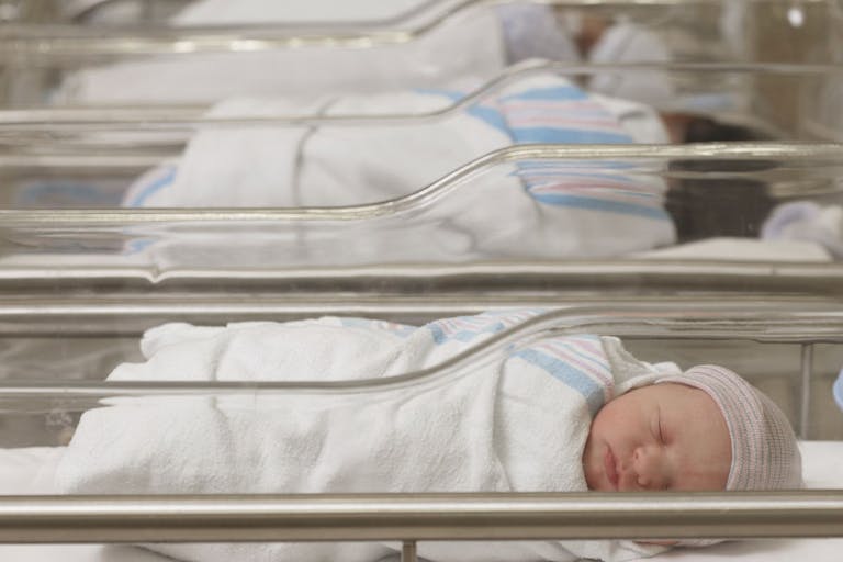 Newborn babies sleeping in hospital nursery Study shows new pro-life laws have saved tens of thousands of lives featured image