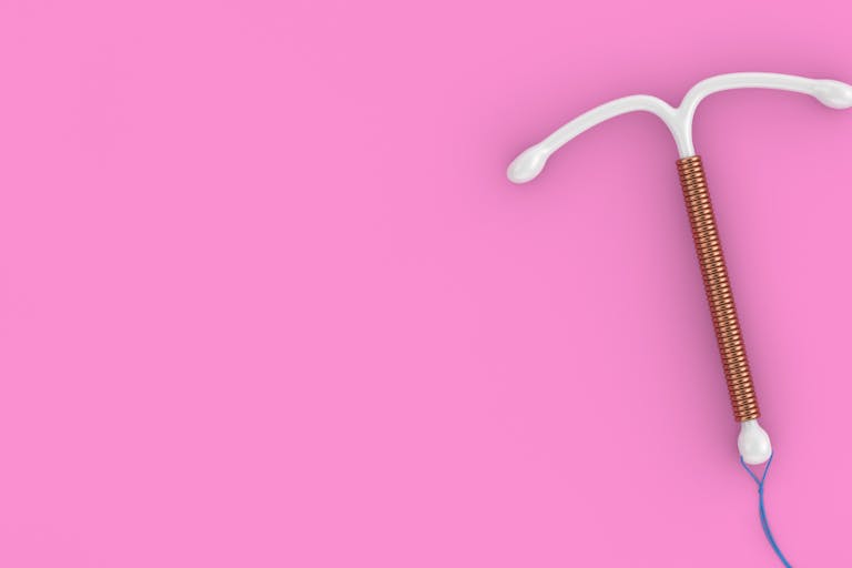 Birth Control Concept. T Shape IUD Copper Intrauterine Device. 3d Rendering The Copper IUD: When hormone-free doesn’t mean side effect-free featured image