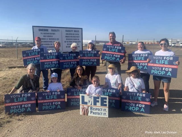 A group of supporters of Prop A hold signs outside the Biocycle/Oncore Technologies Facility in Amarillo, Texas. Had the ordinance passed the companies could not longer treat the remains of dead unborn children, killed by elective abortions, as trash. (Photo: Mark Lee Dickson) Amarillo Sanctuary City for the Unborn Ordinance fails, with help from self-proclaimed ‘pro-life’ opposition image