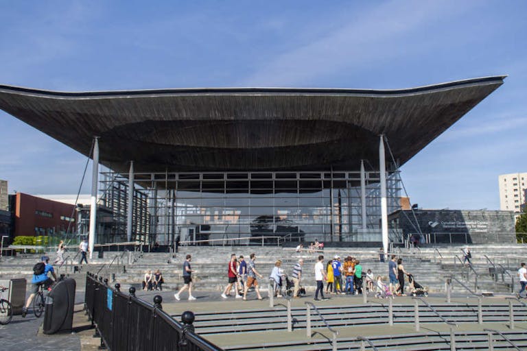 Front view of The Senedd (Welsh National Assembly building) in a sunny day.