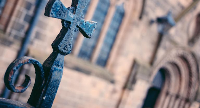 Iron Cross at the gate of the church