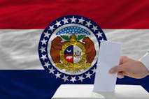elections voting in front of flag of missouri