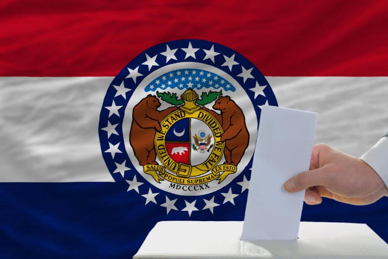 elections voting in front of flag of missouri