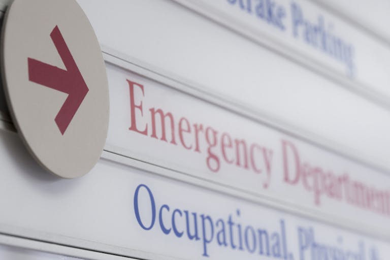Close up of sign for emergency department in hospital