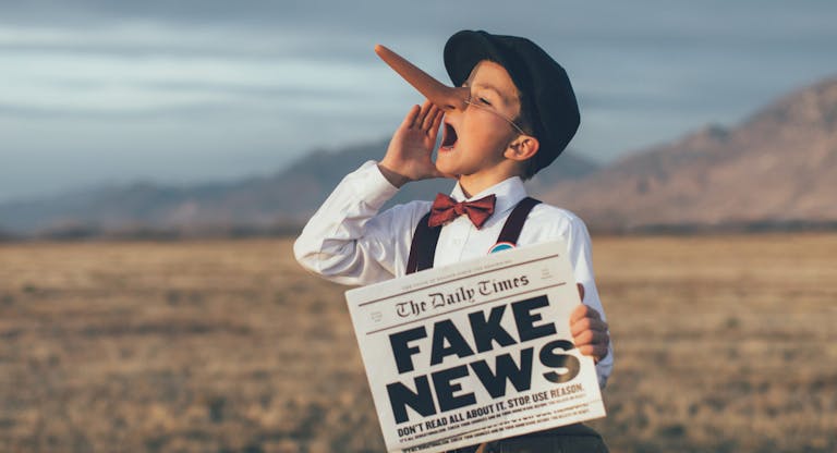 Old Fashioned Pinocchio News Boy Holding Fake Newspaper