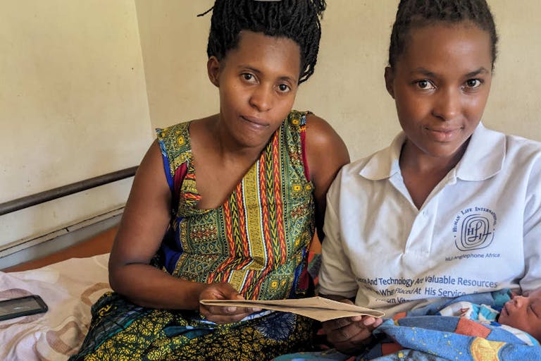 Laurence-left-with-Baby-Keilla-and-Denise-from-Human-Life-International-Rwanda