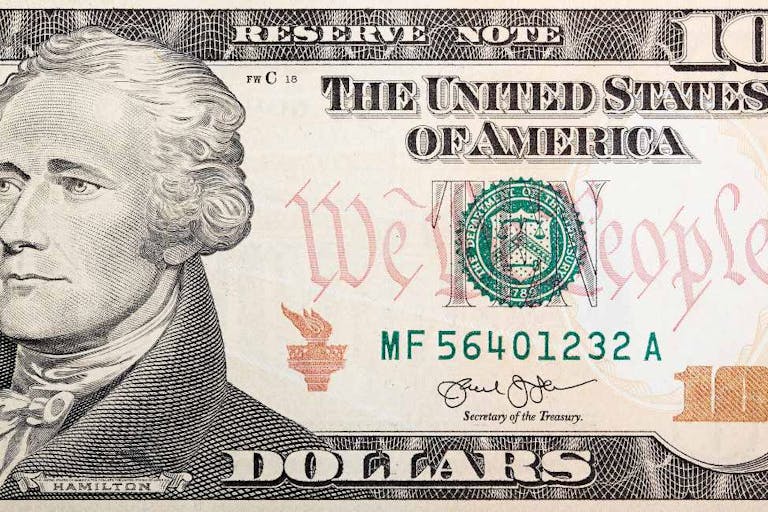 Part of ten dollar bill American money