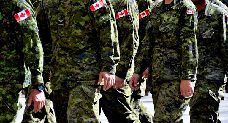 Canadian Soldeiers in Camo Marching