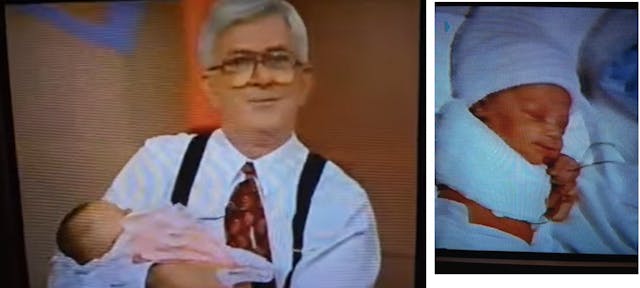 Phil Donahue holds little Ana Rosa Rodriguez whose arm was severed in late abortion Phil Donahue holds little Ana Rosa Rodriguez whose arm was severed in late abortion