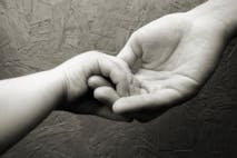 human hand mom baby