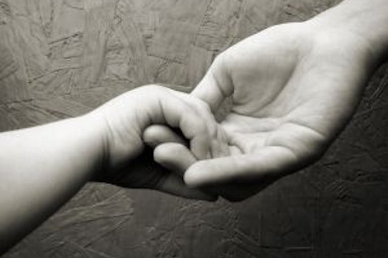 human hand mom baby