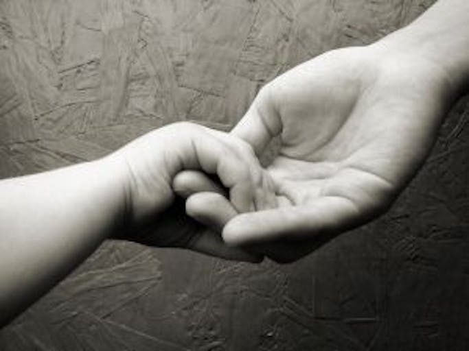 human hand mom baby