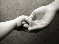 human hand mom baby