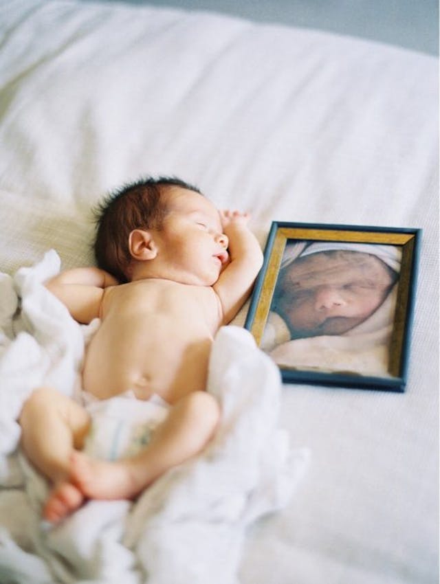 Baby Andrew with a photo of Ethan. Photo courtesy of Kristin Hernandez. Do not reprint. Ethan Hernandez, Trisomy 9