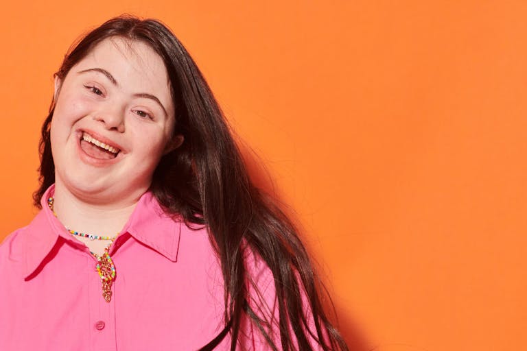 Close up portrait of young woman laughing