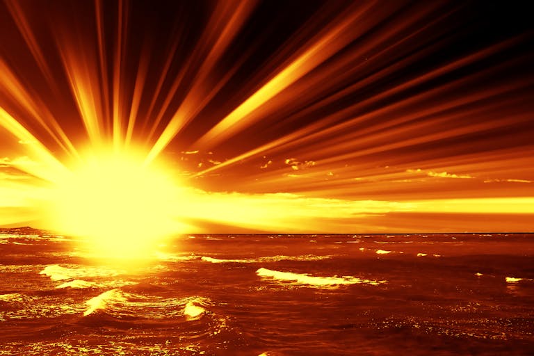 fiery dawn on the ocean sun hope