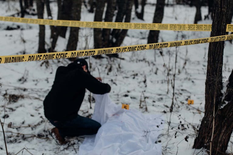 Crime scene – identifying dead person in a snow